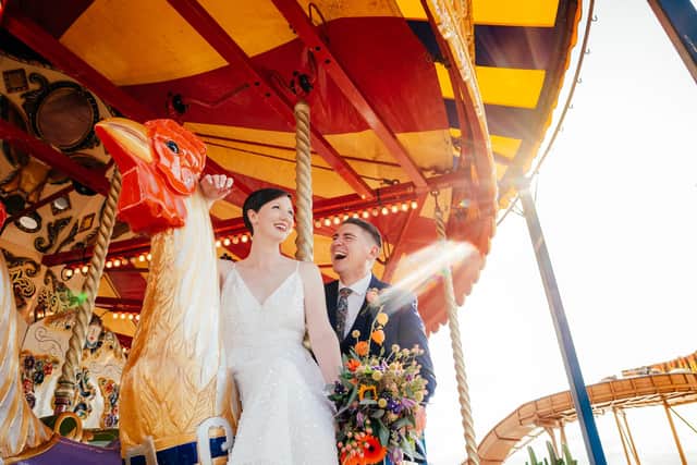 Tilly and Russell on the merry-go-round. Picture: Angela Ward-Brown, angelawardbrown.com
