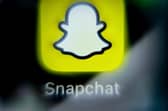 A photo taken on April 3rd, 2024, shows the logo of online messenger Snapchat on a smartphone screen. (Photo by Kirill KUDRYAVTSEV / AFP) (Photo by KIRILL KUDRYAVTSEV/AFP via Getty Images)