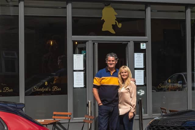 Richard and Debbie in front of Sherlock's Bar. Picture: Mike Cooter (300721)