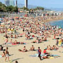 File photo dated 08/09/08 of a general view of Platja Nova Icarie beach in Barcelona. Photo: Owen Humphreys/PA Wire
