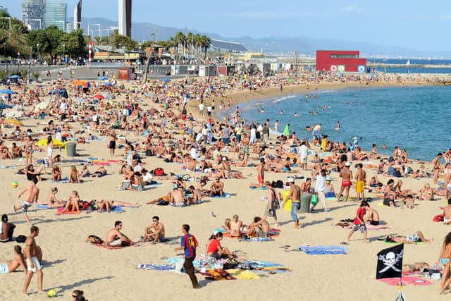 File photo dated 08/09/08 of a general view of Platja Nova Icarie beach in Barcelona. Photo: Owen Humphreys/PA Wire