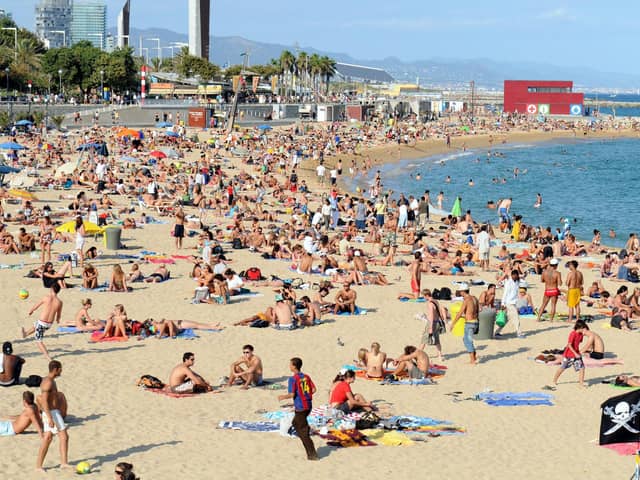 File photo dated 08/09/08 of a general view of Platja Nova Icarie beach in Barcelona. Photo: Owen Humphreys/PA Wire