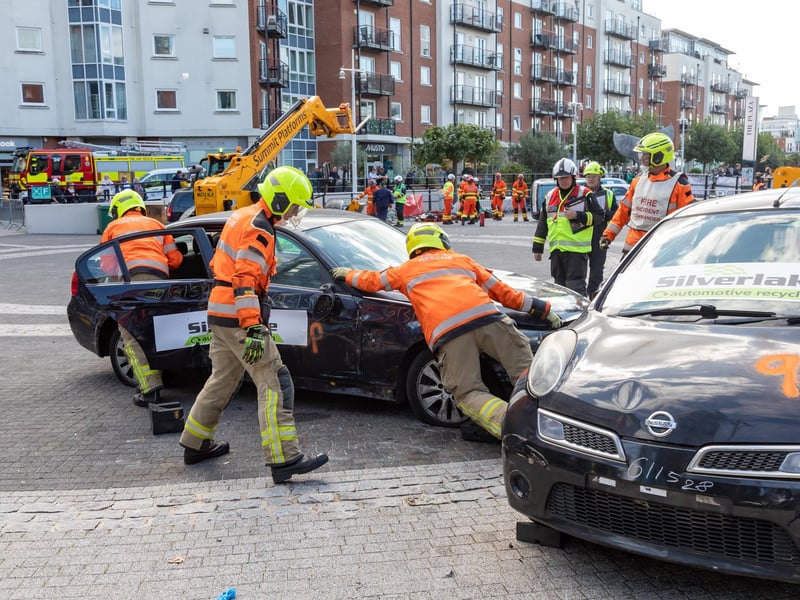 Firefighters demonstrate how to extract victim from a car crash during the UKRO event at Gunwharf Quays. Picture: Mike Cooter (280924)