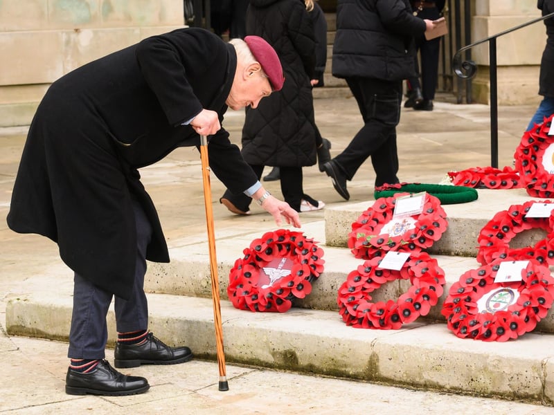 Pictured is: A Red Beret lays his wreath
Picture: Keith Woodland (121121-180)