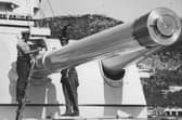 Nice job in the sun... painting the 8in guns of HMS Sussex at Gibraltar. Picture: Andrew August