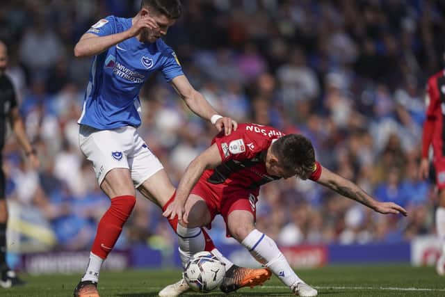Ben Thompson and George Hirst battle for the ball on Saturday.