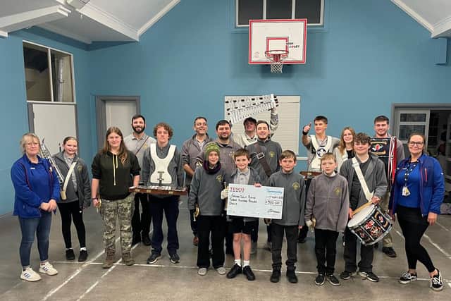 Fareham Scout Band received £300 from Whiteley’s Tesco Superstore for new bugles to be played at D-Day commemorations
