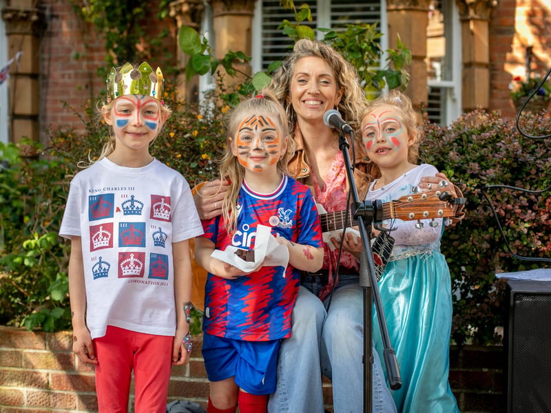 Youngsters with singer Lauren Ross in Essex Road, Southsea