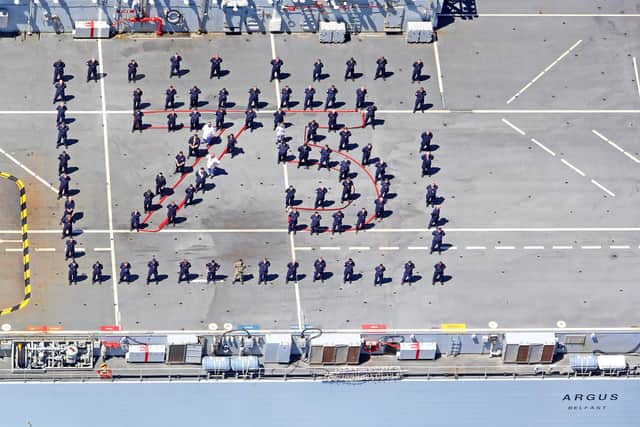 The crew of RFA ARGUS remembers those who served in World War Two and celebrates 75 years since VE Day. Photo: Royal Navy