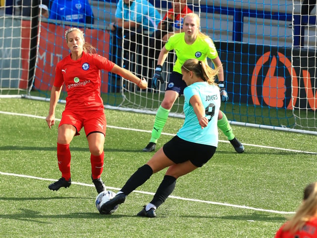 Emma Jones scores the first of her three goals. Picture by Dave Haines