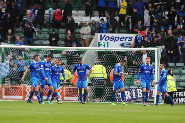 Andy Awford's controversial decision to hand son Nick a full debut in the centre of midfield in the televised clash at Plymouth backfired. Picture: Joe Pepler