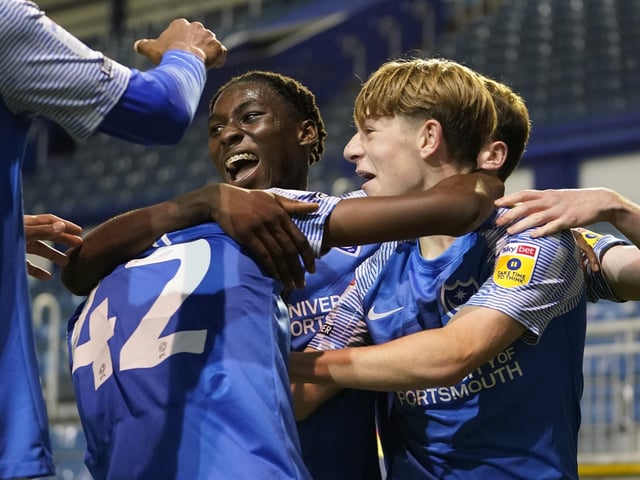 Mottoh's academy team-mates surround him after his maiden Blues strike.