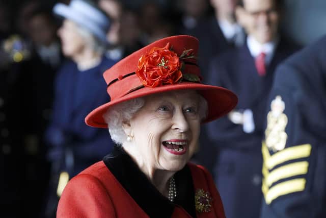 Queen Elizabeth II during a visit to HMS Queen Elizabeth at HM Naval Base, Portsmouth, ahead of the ship's maiden deployment.  Photo credit: Steve Parsons/PA Wire