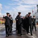 The ship's company of HMS Echo march off during her decommissioning ceremony held in HMNB Portsmouth