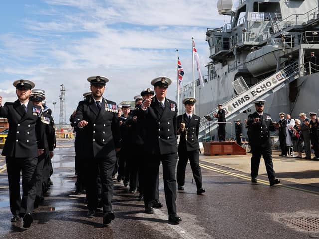 The ship's company of HMS Echo march off during her decommissioning ceremony held in HMNB Portsmouth