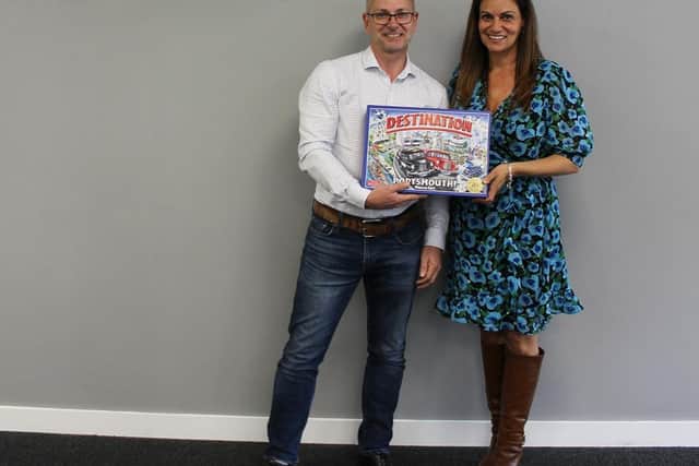 Entrepreneur Rachel Lowe reveals the 20th anniversary of Destination Portsmouth board game is coming later this year. She is pictured with Clive Hutchings, STR Group’s executive director and founder, who has already stepped forward as a sponsor of the new game. Rachel is looking for other businesses to come on board. Picture courtesy of Rachel Lowe.