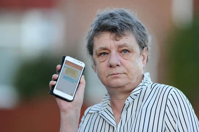Debbie Walsh and her partner Gary Elverstone were scammed by Covid vaccine fraudsters via a text message 
Picture: Sarah Standing (311220-312)