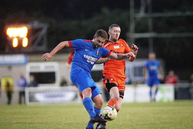 Ethan Jones (blue) converted a penalty as Fareham romped to a 7-1 Wessex Premier victory at Christchurch. Picture: Chris Moorhouse