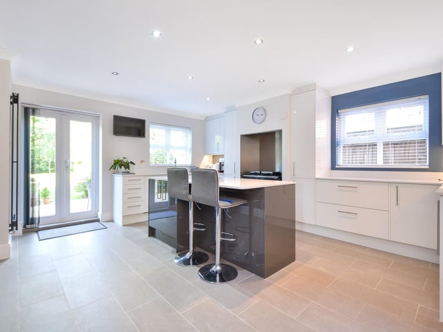 This four bedroom detached family home is on the market at a guide price of £950,000. It is listed by Fine and Country.