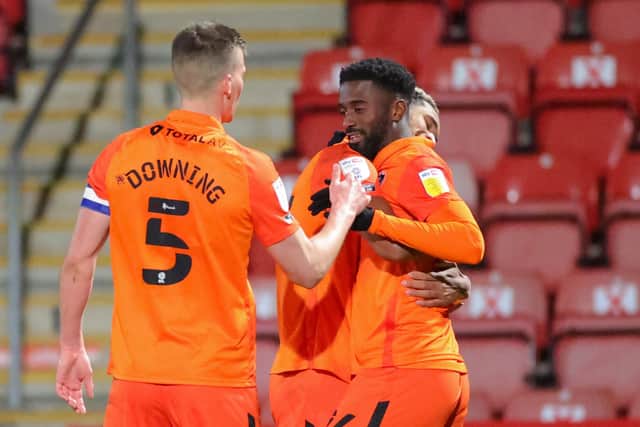 Jordy Hiwula celebrates scoring for Pompey against Cheltenham. Picture: Nigel Keene