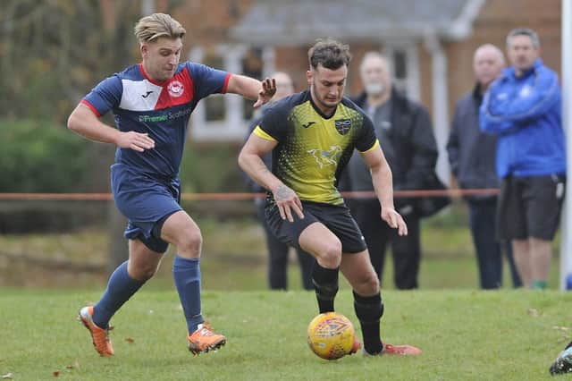 Callum Parker (right) in action for Infinity during a 3-0 Hampshire Premier League victory over Paulsgrove in November 2019 - one of 37 successive Senior Division games the club have remained unbeaten in. Picture: Ian Hargreaves