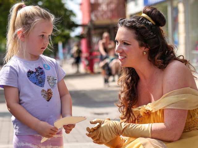 Erin, 4, with Belle. Waterlooville Music and Arts Festival took place in the precinct, Waterlooville
Picture: Chris Moorhouse (170824-68)