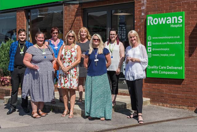 Staff outside the new Rowan's Hospice shop at Park Gate. Picture: Mike Cooter (190721)