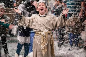 Snow falls at a carol service at St Luke's Church, Southsea