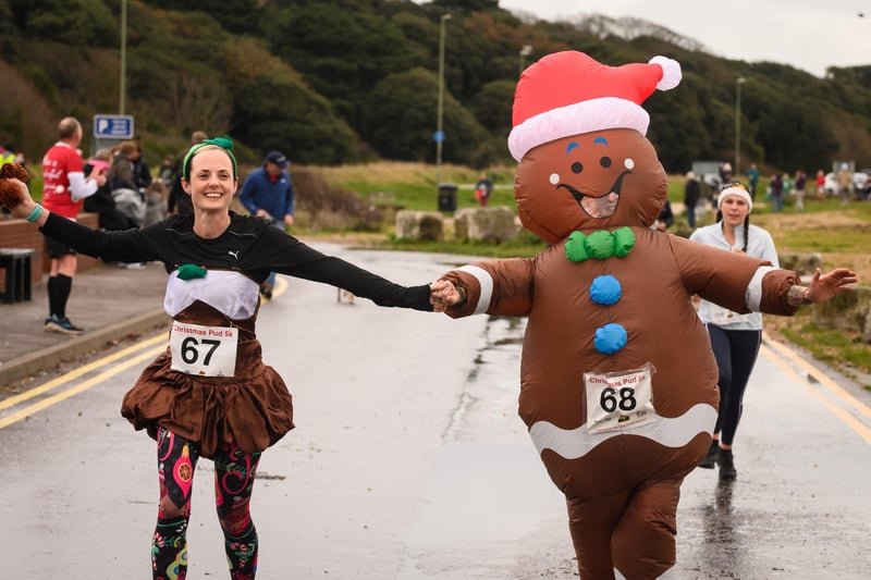 Charlotte and Laura Grimwood get into the festive spirit at the Christmas Pud 5k, Stokes Bay, Gosport