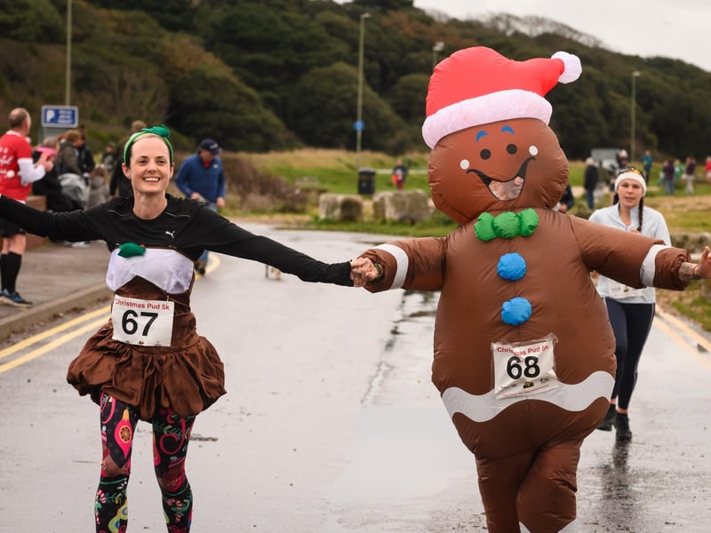 Charlotte and Laura Grimwood get into the festive spirit at the Christmas Pud 5k, Stokes Bay, Gosport