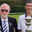 Dave Brookes, right, receives his Champion of Champion silverware from P&D Competition Secretary Simon Batcheler