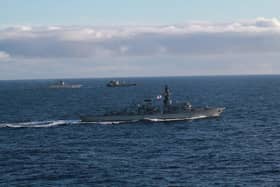 HMS Portland tracks Admiral Gorshkov and tanker in the background. Picture: Royal Navy