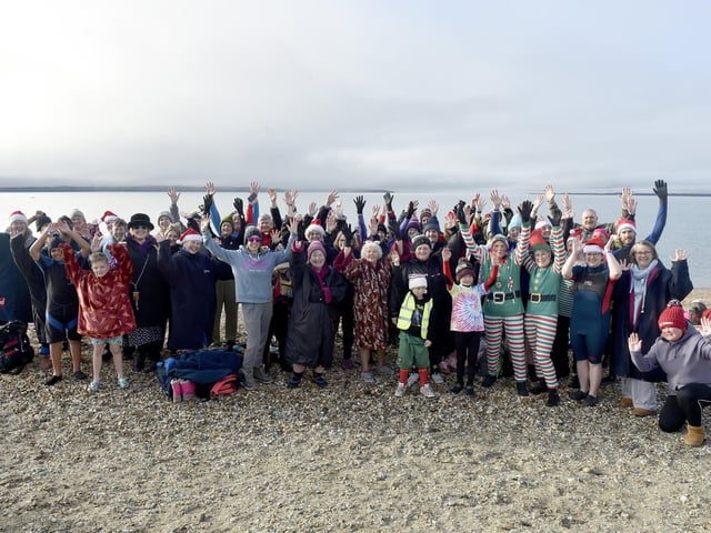 A number of swimmers braved the cold conditions for the traditional Boxing Day swim. Picture: Sarah Standing (261224-8105)