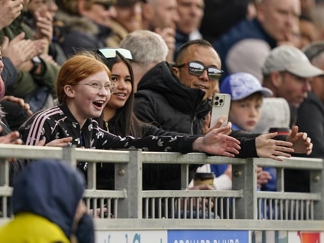 Pompey fans played a big role in carrying their team to a massive three points in their Championship survival battle against Blackburn Rovers.