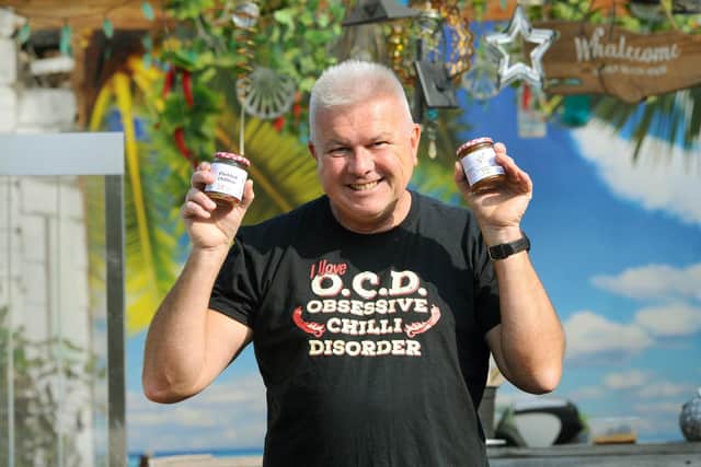 Mark Scarborough with a couple of his jams and chutneys.

Picture: Sarah Standing (220920-7241)