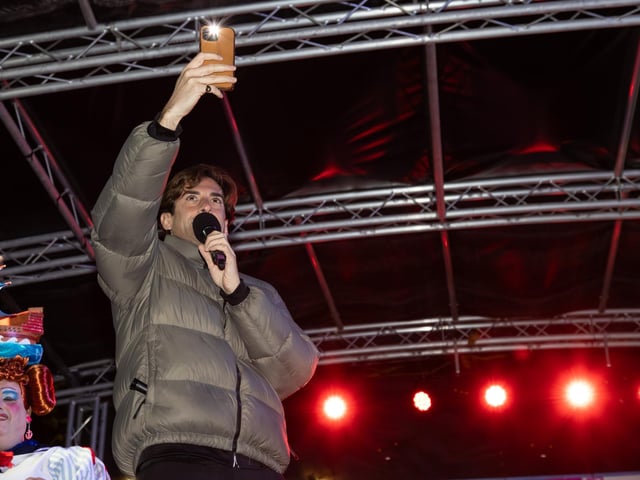 Hundreds of residents descended on Commercial Road to watch local dance troops and celebrities come together to turn on the Christmas lights.Pictured - James Argent and Shaun Williamson sang YMCA to the crowdsPhotos by Alex Shute