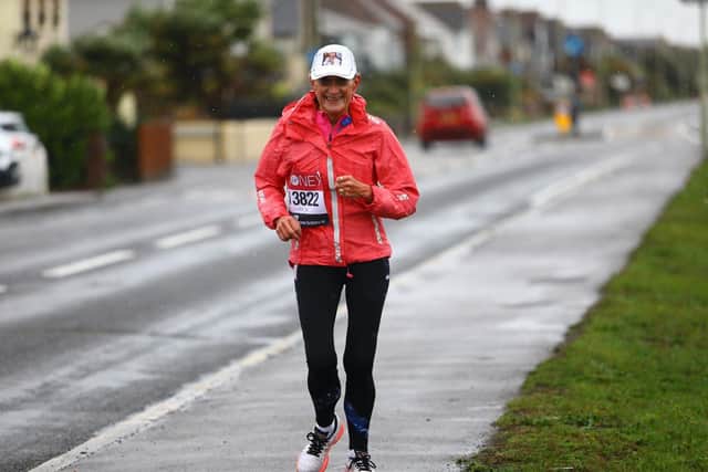 Deirdre running the virtual London Marathon in 2020