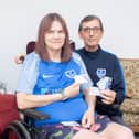 Disabled Pompey fan, Linda Dunford, is upset over poor parking facilities at Portsmouth Football Club. Pictured: Linda Dunford with her partner, Adrian Wheeler at their home in Clanfield on Tuesday 20th June 2023. Picture: Habibur Rahman