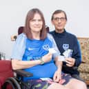 Disabled Pompey fan, Linda Dunford, is upset over poor parking facilities at Portsmouth Football Club. Pictured: Linda Dunford with her partner, Adrian Wheeler at their home in Clanfield on Tuesday 20th June 2023. Picture: Habibur Rahman