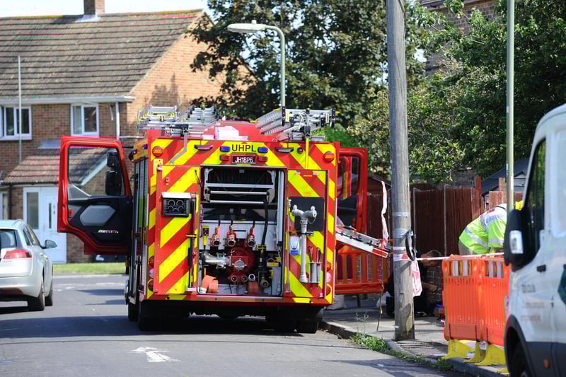 Fire crews remain in the street assessing the damage and the cause of the fire.