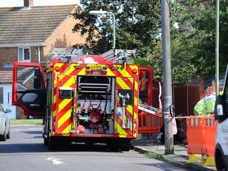 Fire crews remain in the street assessing the damage and the cause of the fire.