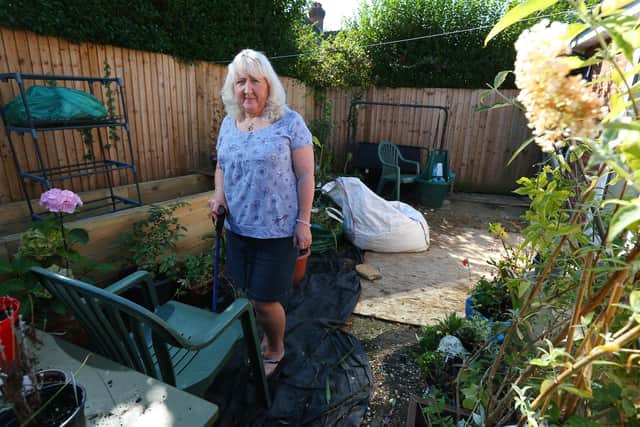 Marie Reagan of Rowlands Castle says her garden revamp has been a disaster and feels that she has been let down by Hampshire police and trading standards officers over the matter too
Picture: Chris Moorhouse  (jpns 200921-28)