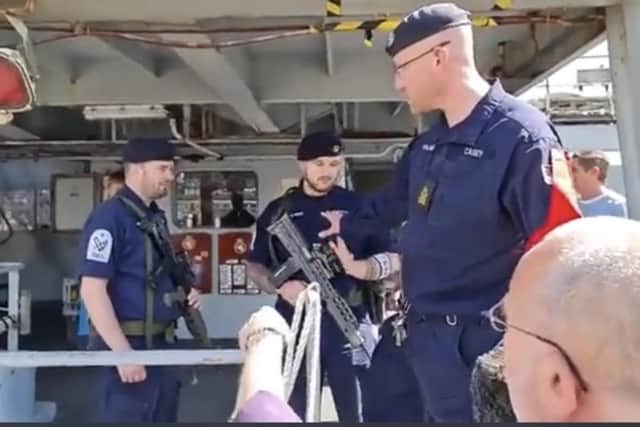 Sailors on board HMS Enterprise pictured stopping a former politician from trying to gain unauthorised access to the ship while it was alongside in Ireland.