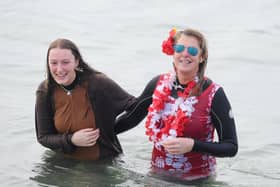 The GAFIRS New Year's Day swim has been cancelled for 2022.
Pictured is: (l-r) Alexandra Earl with her mum Rebecca from Gosport, who braved the sea anyway last year despite the organised dip being cancelled