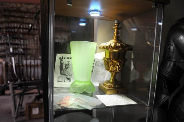 Sally Antiques has on display a green Art Deco vase - a wedding gift from Eva Braun to her husband and Nazi dictator Adolf Hitler. Picture: Sarah Standing (190121-1213)