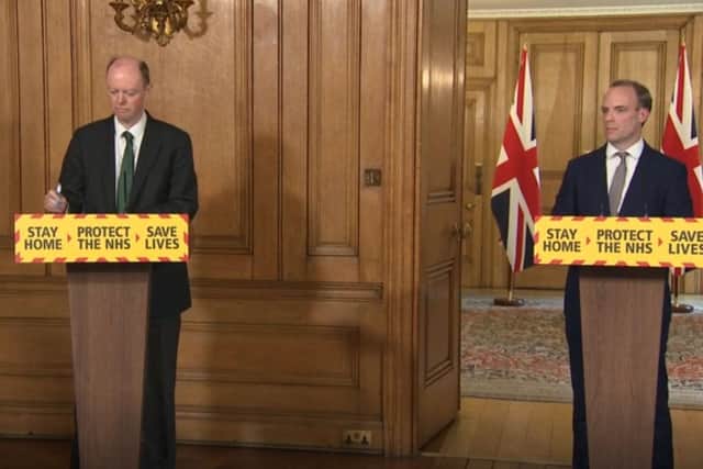 Screen grab of Chief Medical Officer Chris Whitty (left) and Foreign Secretary Dominic Raab during a media briefing in Downing Street, London, on coronavirus (COVID-19). PA Video/PA Wire