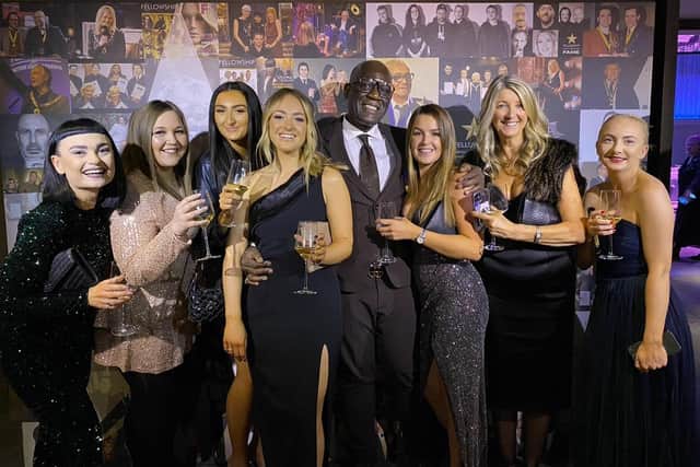 Alex Cook with some of the Wispers Team and Errol Douglas MBE