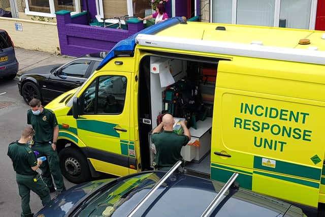 Paramedics pictured at the scene in Westfield Road, Eastney. Photo: Clare Ash