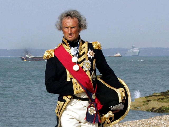 Local Historian Alex Naylor playing the part of Lord Nelson for the day during the Trafalgar 200 celebrations in Portsmouth, Hampshire, Tuesday June 28, 2005. Thousands of spectators and VIP guests will witness the start of the Trafalgar celebrations today. Britain's Queen Elizabeth II will inspect a massive gathering of the world's navies including 167 ships from the Royal Navy and 35 other nations which have anchored at Spithead in the Solent, off Portsmouth, for the International Fleet Review. See PA Story SEA Trafalgar. PRESS ASSOCIATION Photo. Photo credit should read: Gareth Fuller/PA