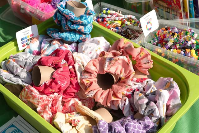 Hair scrunchies for sale at Grace's stall. Picture: Keith Woodland (260921-11)